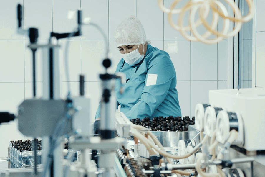 pharmaceutical logistics employee working on medications