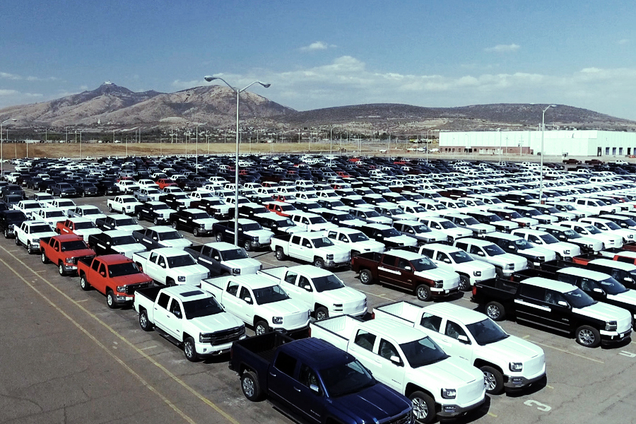 multiple vehicles at a yard