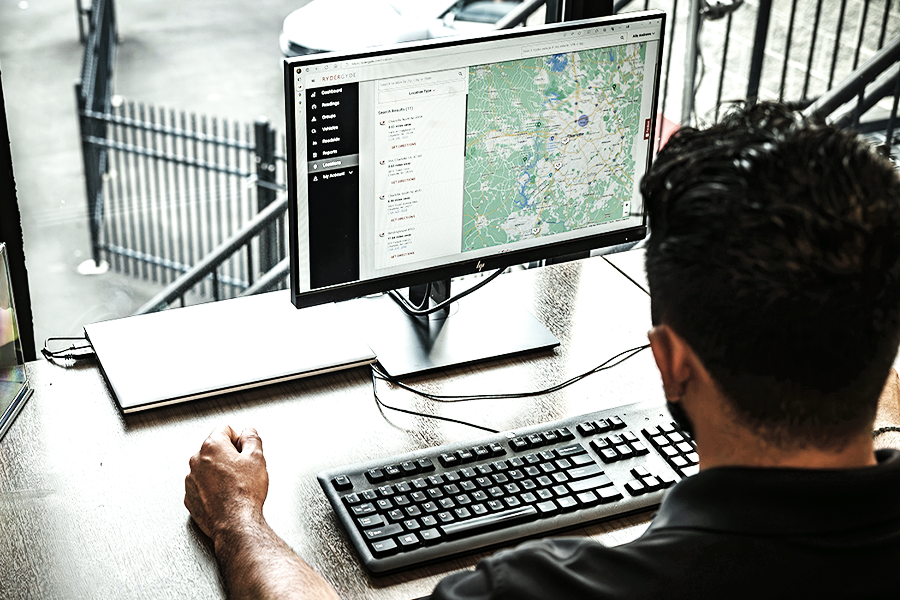 employee looking at load board freight prices